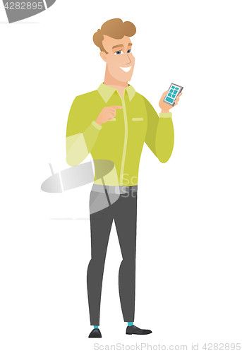 Image of Caucasian business man holding a mobile phone.