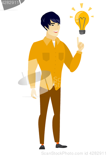 Image of Businessman pointing at business idea light bulb.