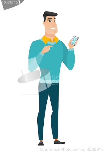 Image of Caucasian business man holding a mobile phone.