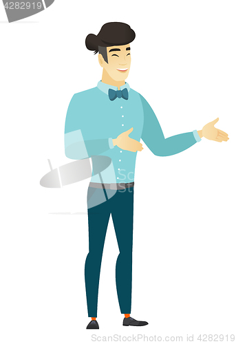 Image of Young asian happy businessman gesturing.