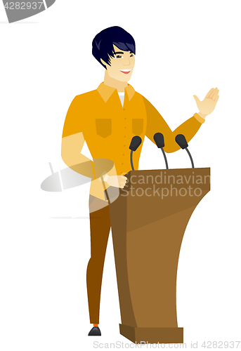 Image of Politician giving a speech from tribune.