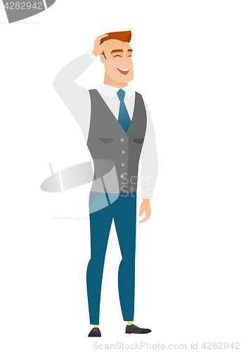 Image of Young caucasian office worker laughing.