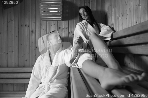 Image of couple relaxing in the sauna