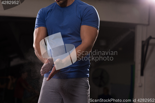 Image of Gym Chalk Magnesium Carbonate hands clapping man