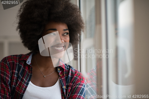 Image of portrait of a young beautiful black woman