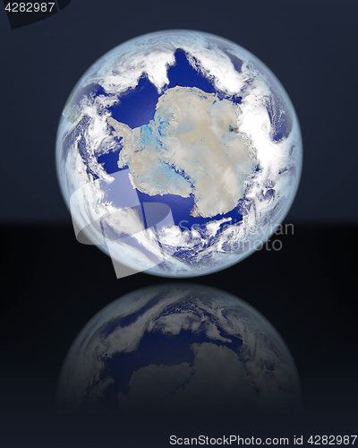 Image of Globe facing Antarctica in dark