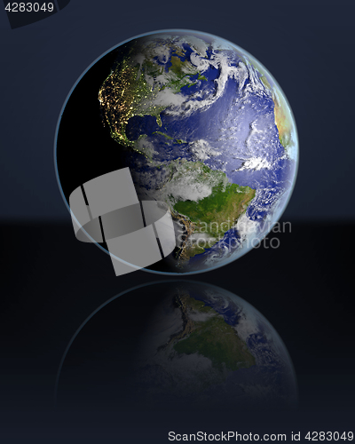 Image of Globe facing Americas in dark