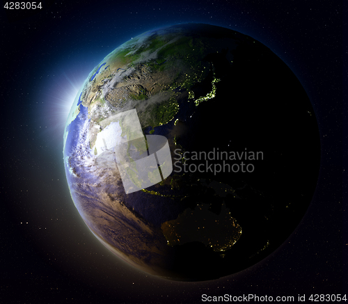 Image of East Asia from space at sunset