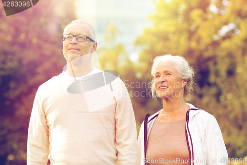 Image of senior couple in city park