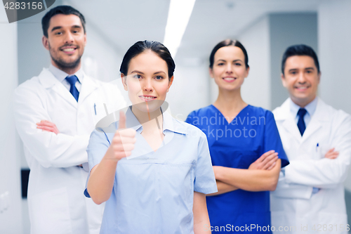 Image of medics or doctors at hospital showing thumbs up