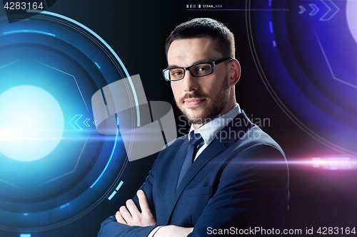 Image of businessman in glasses over black