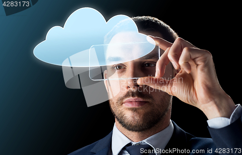 Image of businessman with transparent smartphone