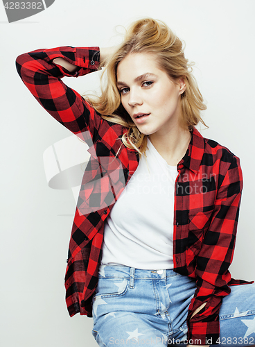 Image of young pretty stylish blond hipster girl posing emotional isolated on white background happy smiling cool smile, lifestyle people concept