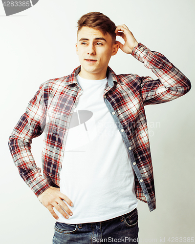 Image of young handsome teenage hipster guy posing emotional, happy smiling against white background isolated, lifestyle people concept