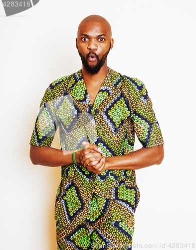 Image of portrait of young handsome african man wearing bright green nati