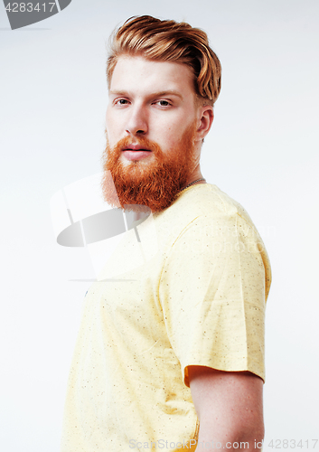 Image of young handsome hipster ginger bearded guy looking brutal isolated on white background, lifestyle people concept