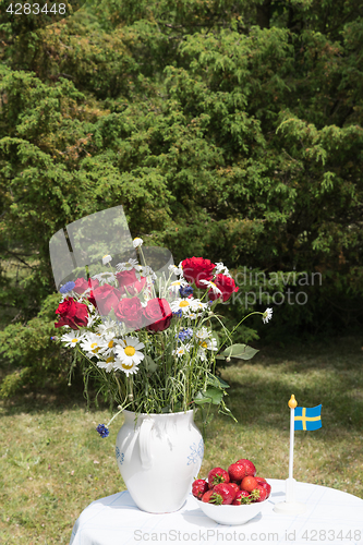 Image of Midsummer decorated table in Sweden