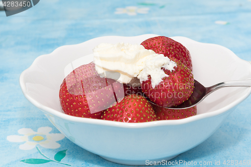 Image of Fresh strawberries with whipped cream