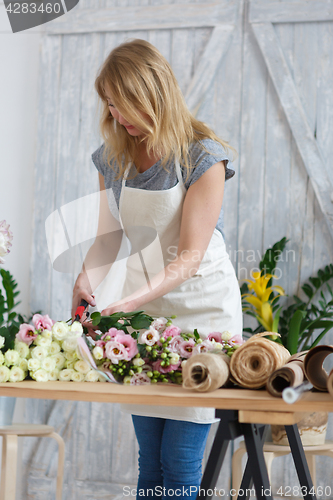 Image of Image of blonde florist girl