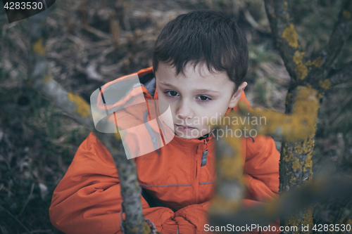 Image of Portrait of sad little boy