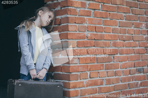 Image of Portrait of sad little girl