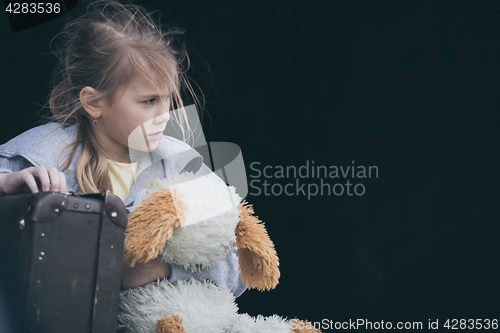 Image of Portrait of sad little girl