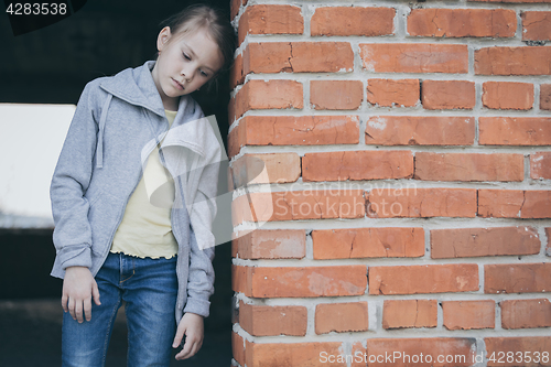 Image of Portrait of sad little girl