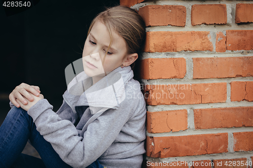 Image of Portrait of sad little girl