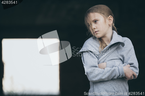 Image of Portrait of sad little girl