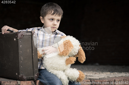 Image of Portrait of sad little boy