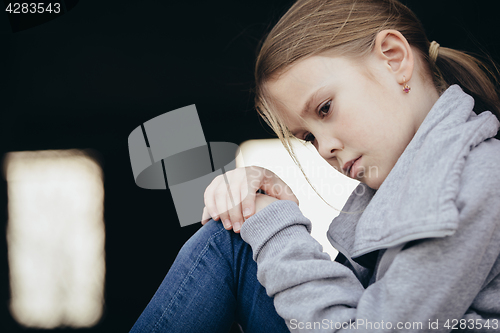 Image of Portrait of sad little girl