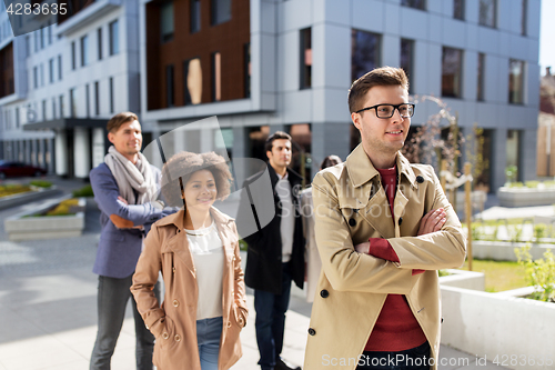 Image of international group of people on city street