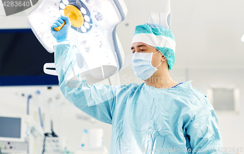 Image of surgeon in operating room at hospital