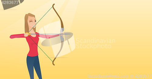 Image of Young caucasian archer training with a bow.