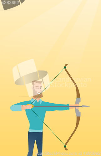 Image of Young caucasian archer training with a bow.