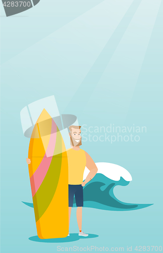 Image of Young caucasian surfer holding a surfboard.