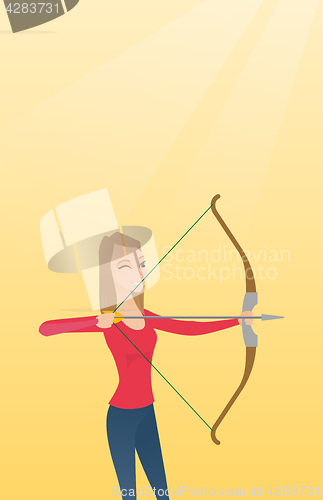 Image of Young caucasian archer training with a bow.