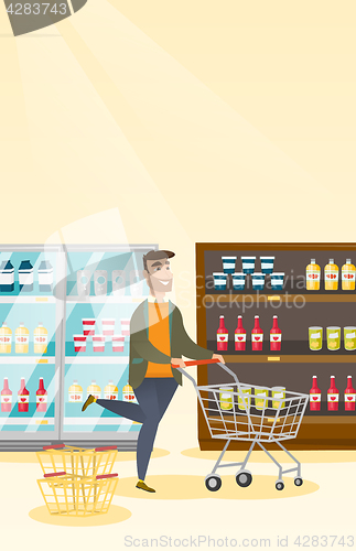 Image of Caucasian man running with a trolley in the store.