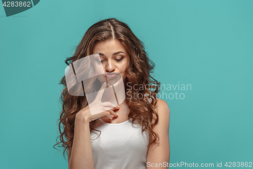 Image of The young woman\'s portrait with sad emotions