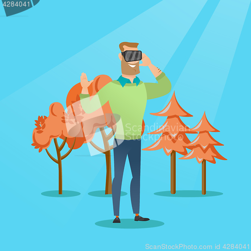 Image of Man wearing virtual reality headset in the park.