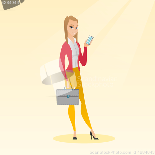 Image of Caucasian business woman holding a mobile phone.