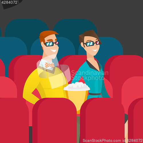 Image of Caucasian couple watching 3D movie in the theatre.