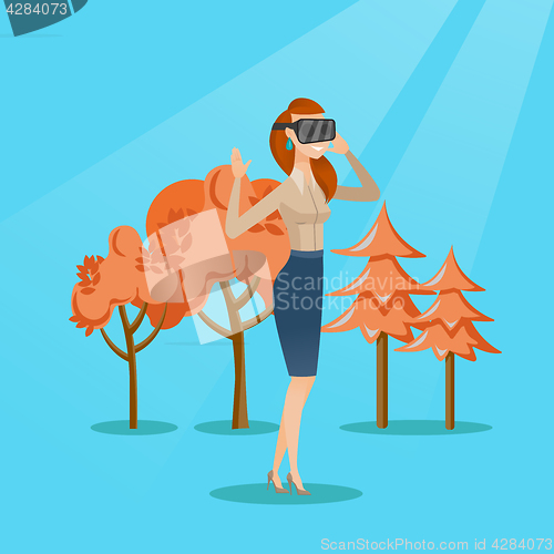 Image of Woman wearing virtual reality headset in the park.