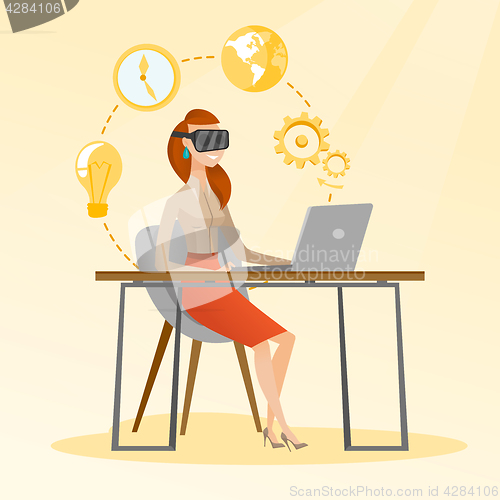 Image of Business woman in vr headset working on a computer