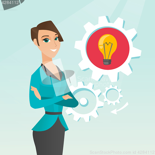 Image of Caucasian woman with business idea bulb in gear.