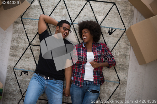 Image of Top view of attractive young African American couple