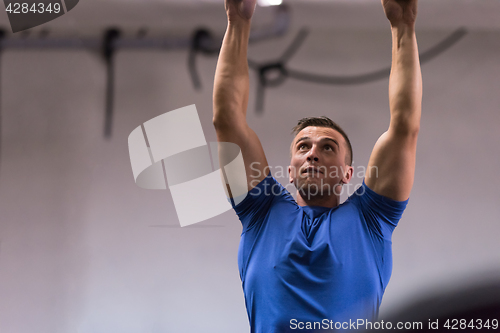 Image of man doing dipping exercise