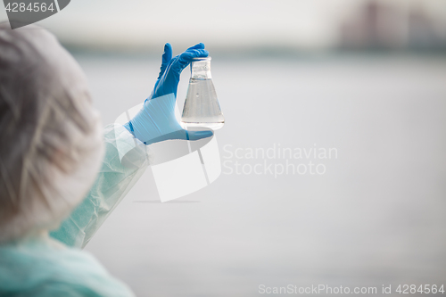 Image of Photo of chemist from back