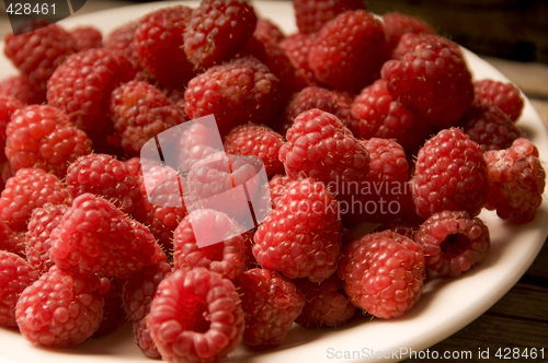 Image of Raspberries on a plate. Shallow Dof