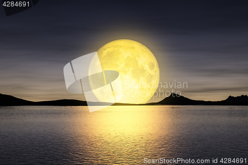 Image of moon rising over the sey